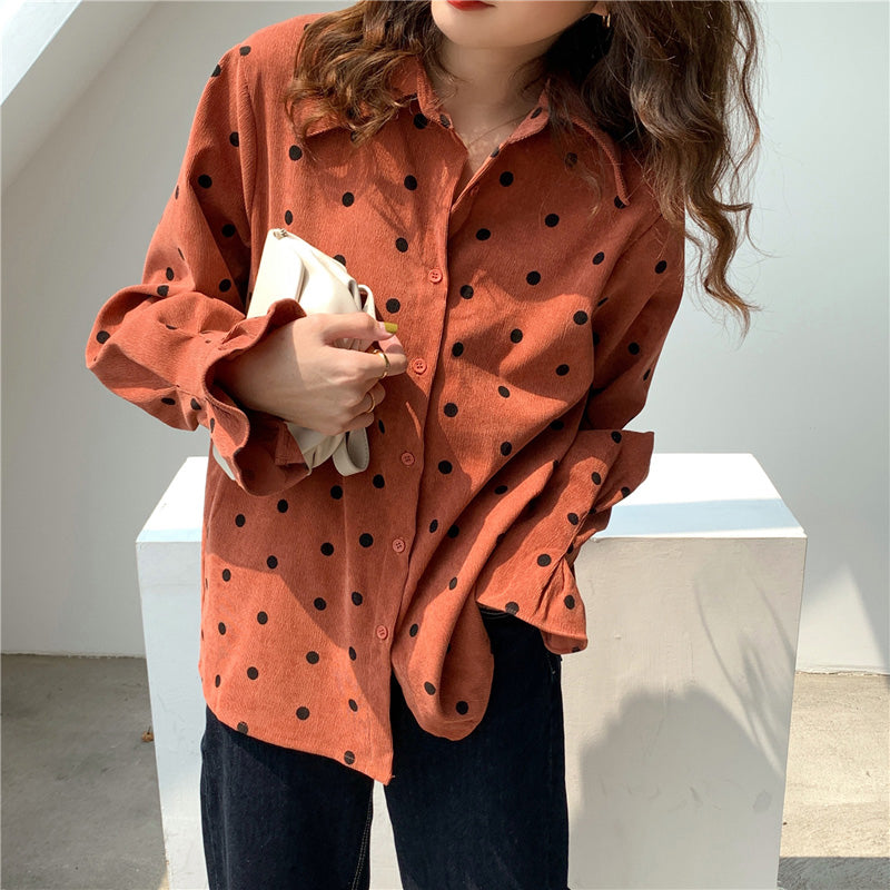 orange polka dot shirt