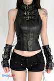 Person wearing a black leather outfit with gloves and shorts on a white background