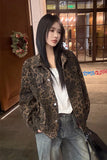Person wearing a leopard print jacket in an urban setting