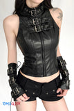 Person wearing a black leather outfit with buckles on a white background