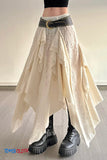 Beige lace skirt with a black belt and black platform boots on a neutral background