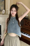 Woman posing in a room with a piano