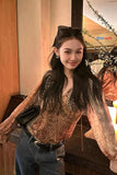 Add a bold touch of timeless style to your wardrobe with the Long Sleeve Vintage Leopard Pattern Blouse Shirt, a statement piece designed for women who love confident fashion with a classic retro edge. Featuring a striking leopard print, elegant blouse silhouette, and long sleeve design, this top brings together vintage charm and modern versatility.

The standout feature of this blouse is the vintage leopard pattern, which adds personality and bold visual appeal to any outfit. Inspired by timeless retro fas