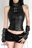 Person wearing a black leather outfit with buckles on a white background