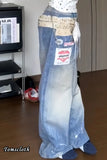 Long blue dress with visible tags on a wooden floor.