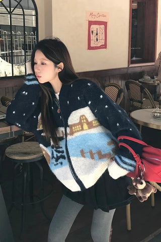 Woman wearing a patterned sweater in an indoor setting